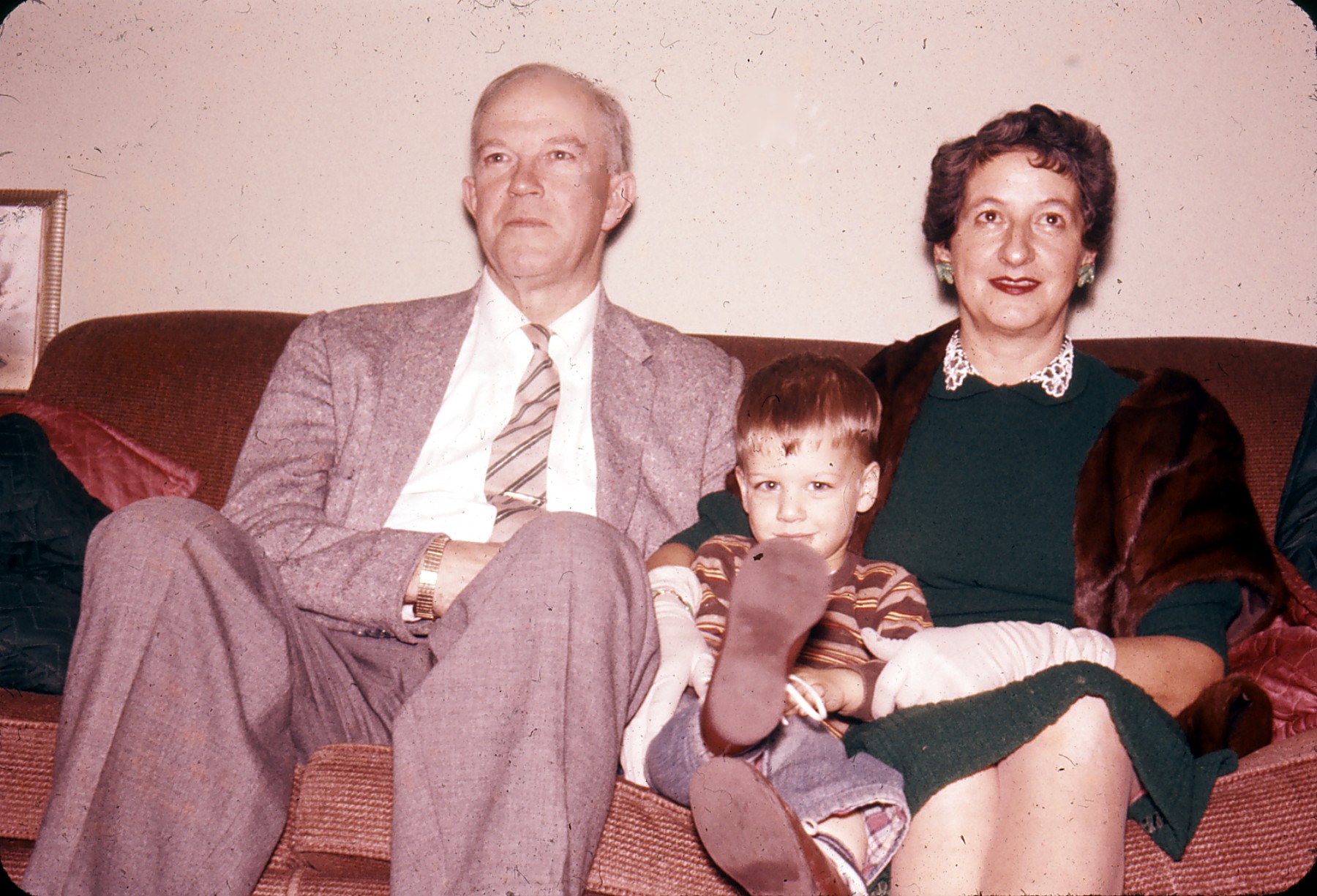 Bill and Mary (Christiano) Dumaresq. Grandson, Michael, in the middle. Circa 1960. Vancouver, BC